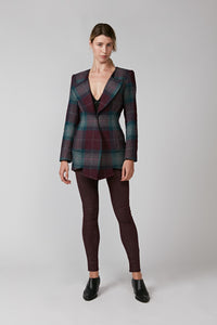 The Signature Jacket in structured British wool with a bold check in burgundy and teal.